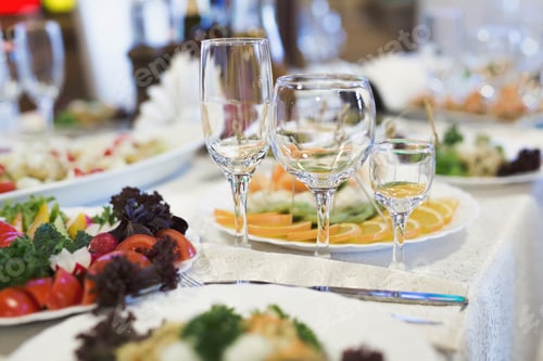 Preview: Served wedding banquet table with dishes in the restaurant