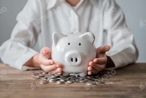Preview: hand holding piggy bank, saving money and finance accounting concepts