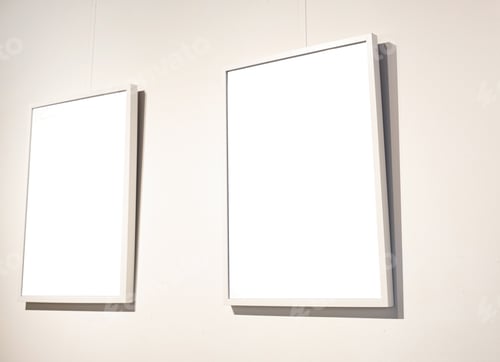 Preview: Blank picture frames on grey wall with glowing lamp, mock up