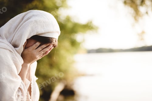Preview: Closeup shot of a female wearing a biblical robe - concept confessing her sins