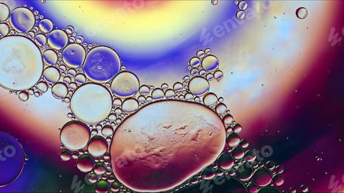 Preview: Abstract Colorful Food Oil Drops Bubbles and spheres Flowing on Water Surface