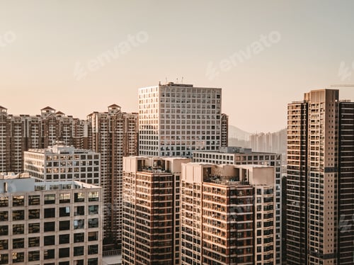 Preview: Cityscape of modern residential buildings under the sunlight in the evening - perfect for wallpapers
