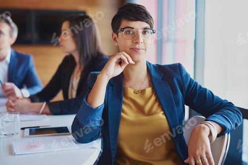 Preview: Professional Woman in Meeting Room Wearing Blazer
