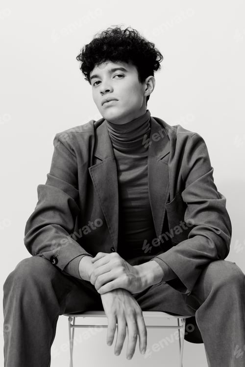 Preview: Man black hair and white clothing male handsome modern style trendy pose suit studio fashion