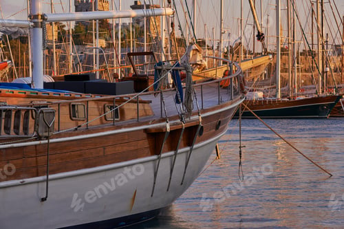Preview: Old sailboats at sunset. Olds sailboat.