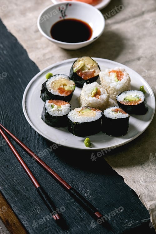 Preview: Homemade sushi rolls set with salmon, japanese omelette, avacado and soy sauce