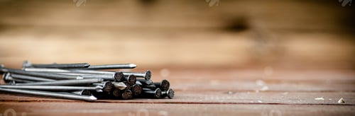 Preview: A pile of nails on the table.