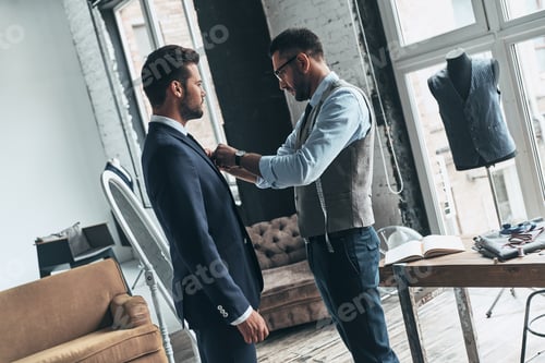 Preview: Stylish Men Fashion Design Indoors in Workshop