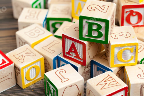 Preview: Alphabet blocks ABC on wooden table. creative photo