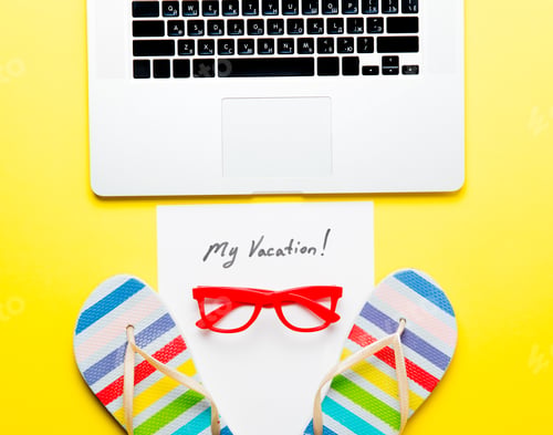 Preview: paper My Vacation, laptop, sandals and glasses