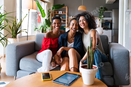 Preview: Three mixed race hispanic and black women bonding at home