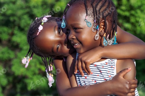 Preview: A Warm Hug: Sisters Embracing in a Tender Moment