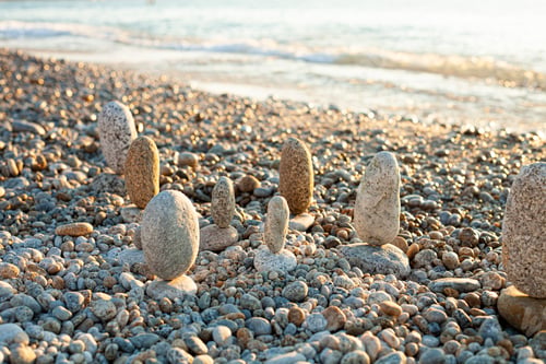 Preview: Beautiful seascape, amazing view of pebble coastline in mild sunset light.