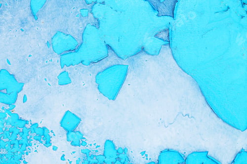 Preview: Old blue paint peeling from metal or concrete wall texture background.