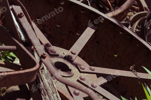 Preview: Big Old Rusted Carriage Wheels On The Ground