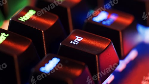 Preview: Keyboard key - End - macro shot. Modern gaming keyboard close-up with beautiful color backlight.