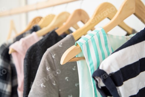 Preview: Hangers with woman clothes wardrobe