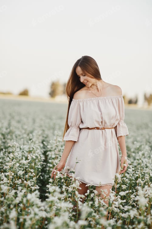 Preview: Beautiful woman enjoying field, happy young lady and spring green nature, harmony concept. portrait