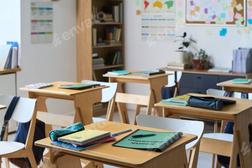 Preview: Empty Classroom Showing Desks with Educational Materials during School Day