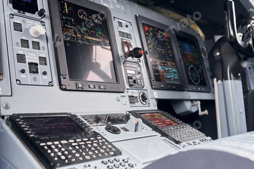 Preview: Display with information. Close up focused view of airplane cockpit