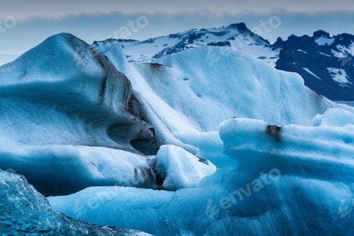 Preview: Blue iceberg floating in Jokulsarlon glacier lagoon at Vatnajokull national park, Iceland