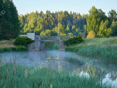 Preview: River, rapids and fog in Finland in summer morning.