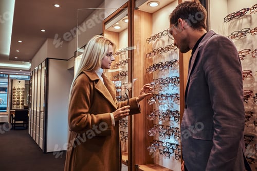 Preview: Woman is choosing new frames for glasses