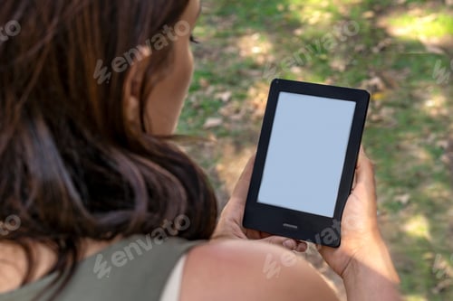 Preview: A modern black electronic book with a white blank empty screen. E-Book Reader and book mock up