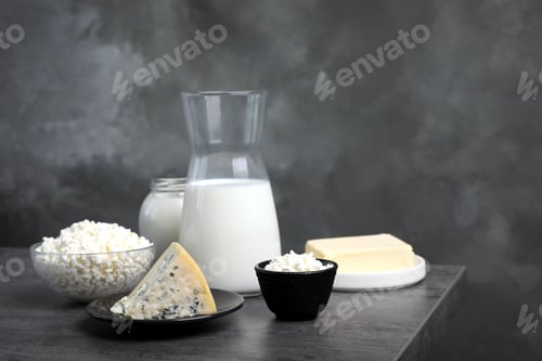 Preview: Different fresh dairy products on table