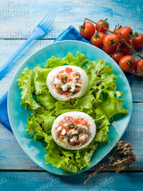 Preview: mozzarella stuffed with capers and tomatoes