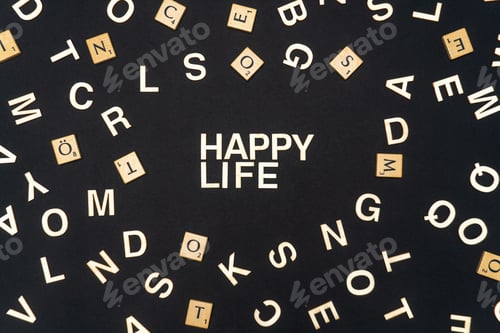 Preview: HAPPY LIFE word written on dark paper background. HAPPY LIFE text for your concepts