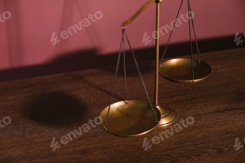 Preview: Scales of justice on table, closeup view