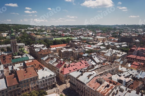 Preview: Town and cloudy sky.