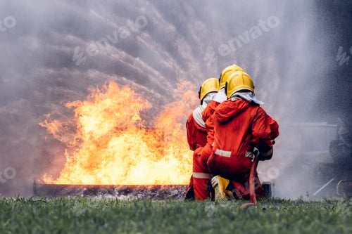 Preview: Firefighter Concept. Several firefighters go offensive for a fire attack.