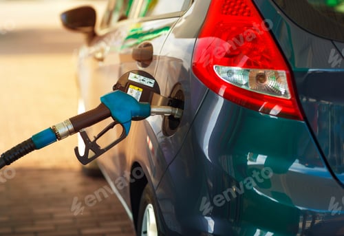 Preview: Car refueling on a petrol station close up