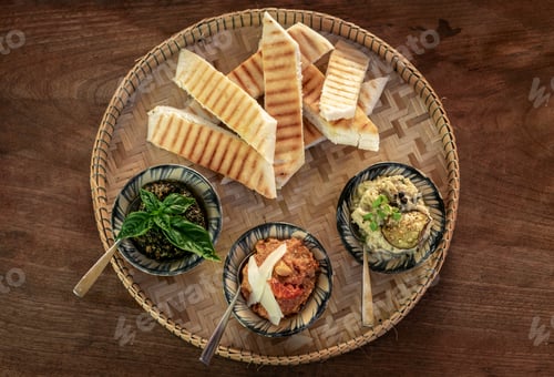 Preview: turkish meze vegetarian tapas snack platter on rustic wood table