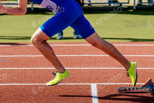 Preview: male athlete start running in starting blocks sprint race, summer athletics championships
