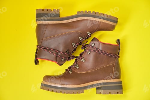 Preview: New womens leather brown waterproof winter boots on yellow background
