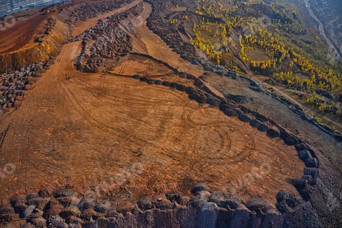 Preview: Huge mounds of waste iron ore near the quarry