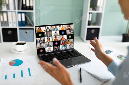 Preview: Businessperson Leading Video Conference With Diverse Team Members in Office
