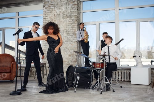 Preview: Young international musicians, a band performing on the loft stage. The concept of music, hobby