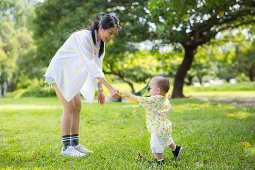 Preview: Mother play with her son at park
