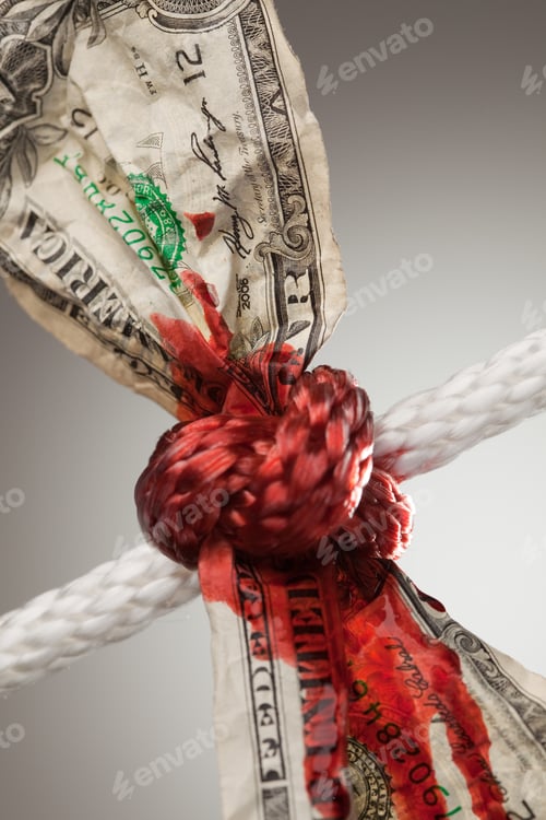 Preview: Wrinkled American Dollar Tied Up and Bleeding in Rope.