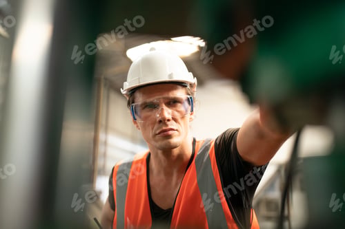 Preview: Mature man on construction site or business industry site.