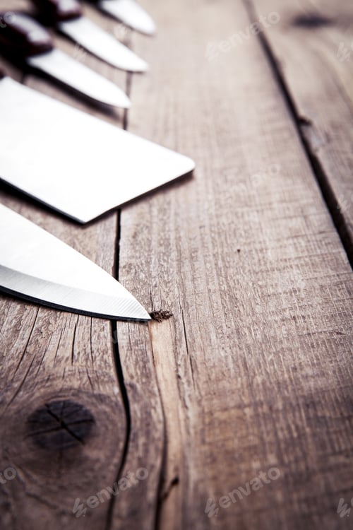 Preview: Beautiful knives with wooden handle, on an old table. Kitchen, cooking, cutting