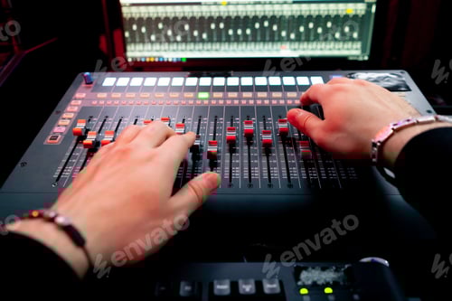 Preview: close up the recording room dark with neon lighting in the studio the sound engineer works with the