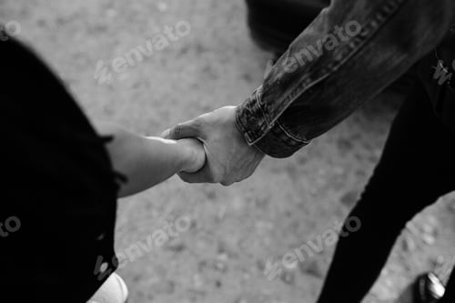 Preview: female and male hands together