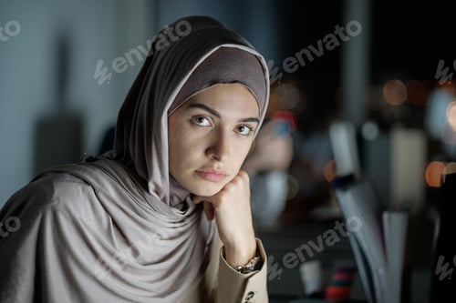 Preview: Young serious Muslim businesswoman in hijab