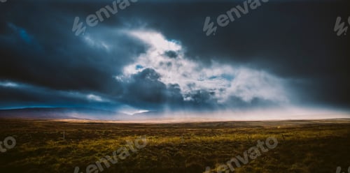 Preview: Beautiful and colorful blue skies with clouds and mountains in the background.
