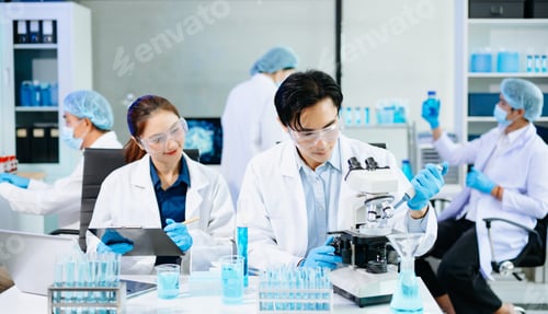 Preview: Scientists collaborating in a modern lab with microscopes and blue liquids,